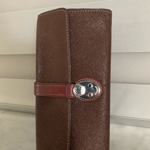 Tumi burgundy Textured Wallet with Buckle - Picture 1 of 8